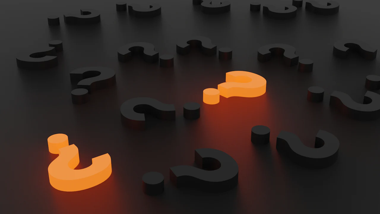Glowing 3D question marks on a dark background