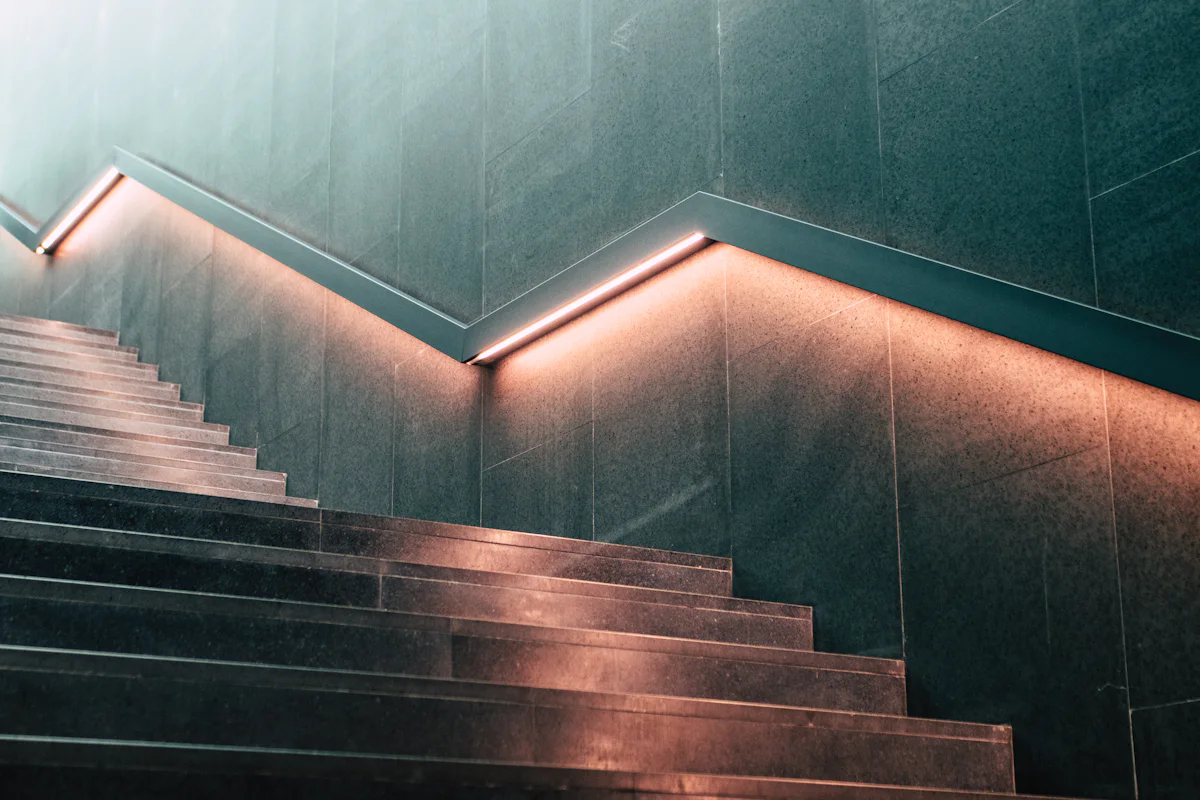Illuminated staircase leading upward
