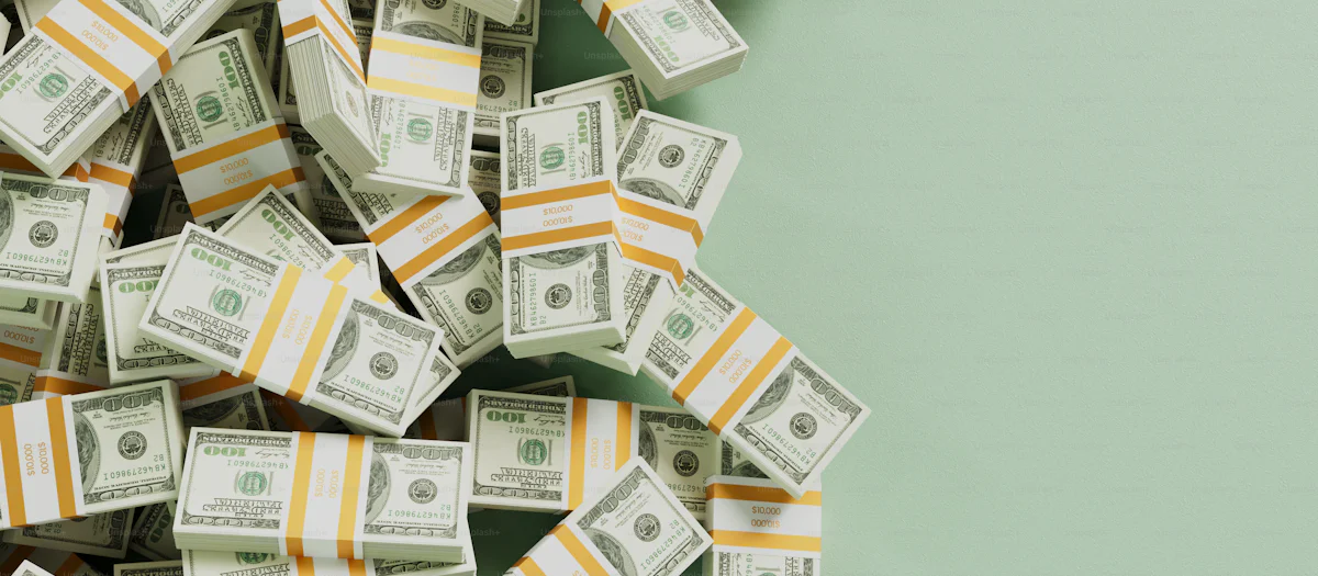 Stacks of cash on a green background